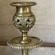 pair of openwork gilded brass candlesticks from the 19th century