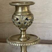 pair of openwork gilded brass candlesticks from the 19th century