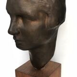 Bronze young woman's head