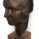 Bronze young woman's head