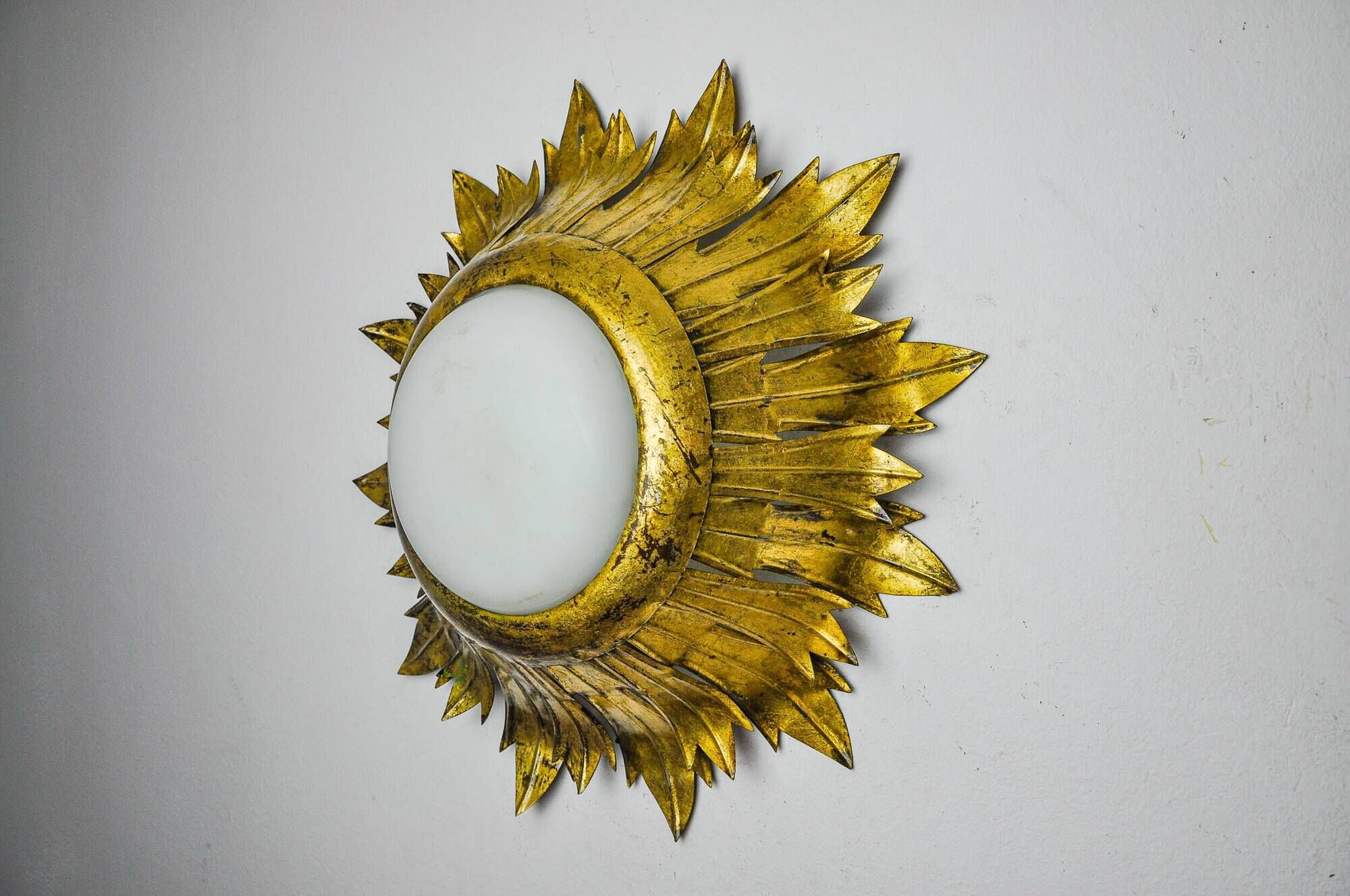 Sun wall lamp by ferro arte, metal and gold leaf, Spain, 1960