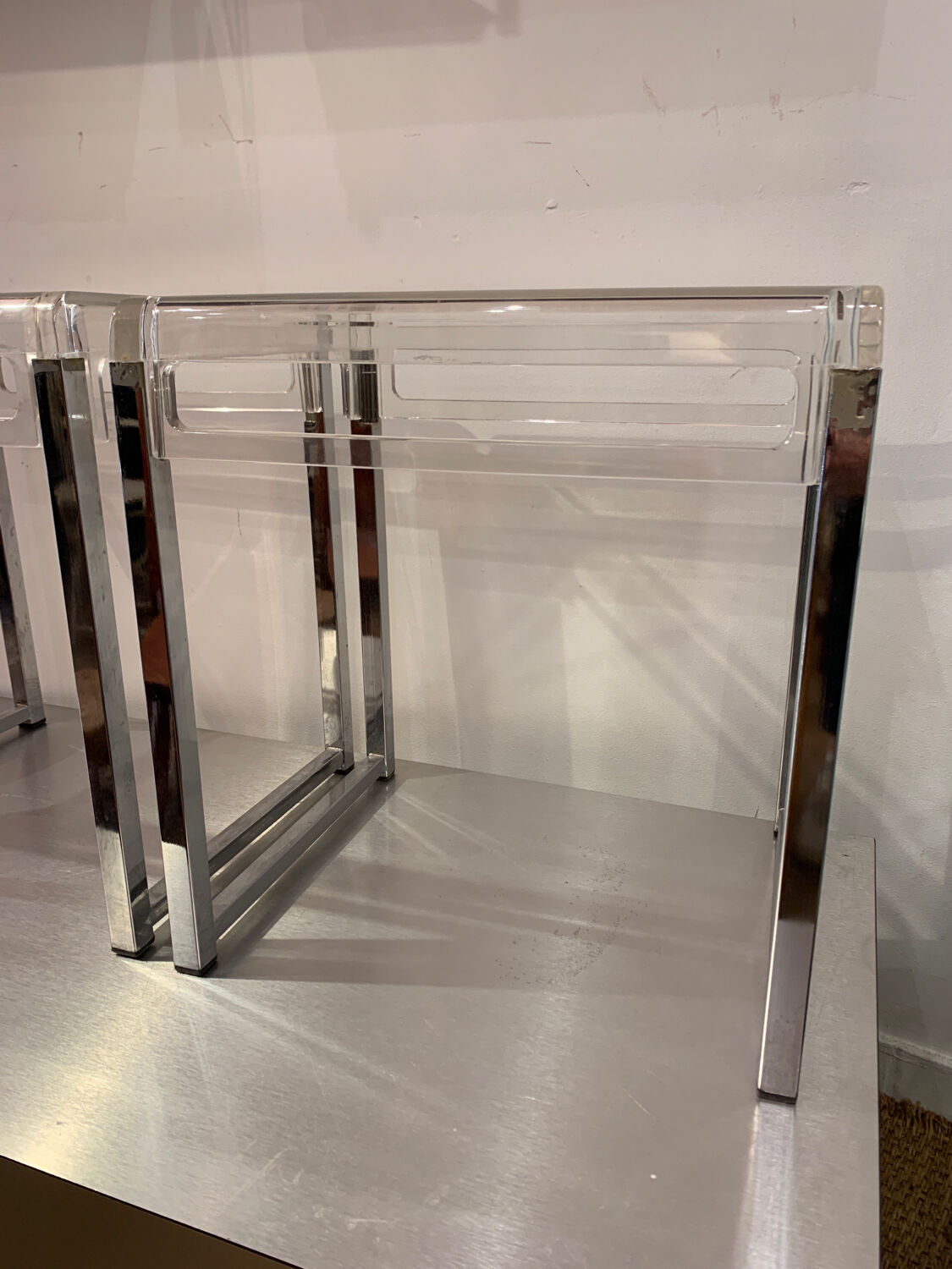 Pair of vintage chrome and acrylic glass bedside tables