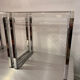 Pair of vintage chrome and acrylic glass bedside tables
