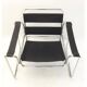 Fauteuil tubulaire et cuir noir