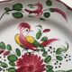 Assiette faience ancienne décor panier & oiseau