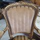 Paire de fauteuils en bois dore style Louis XVl