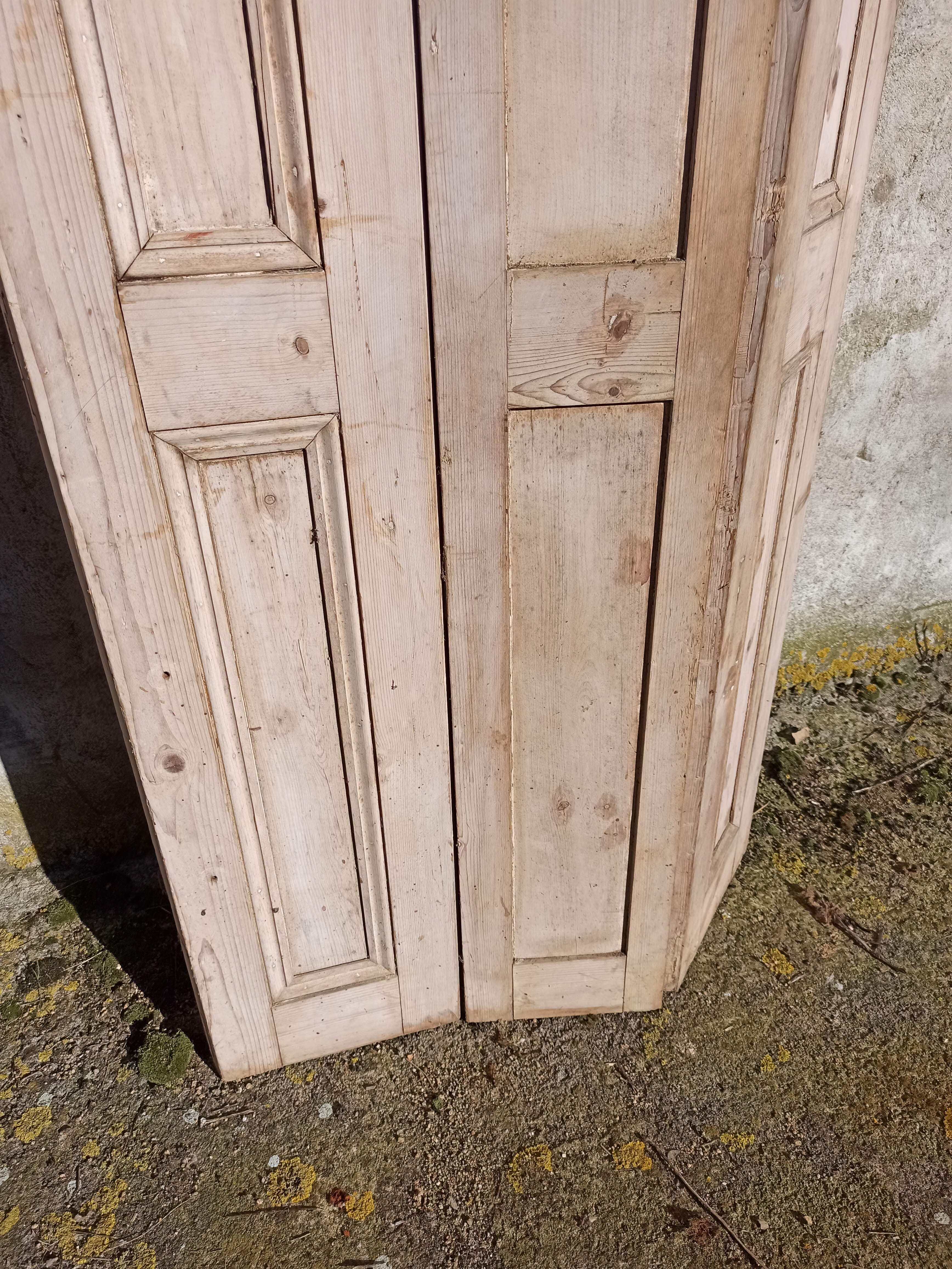 Old trio of wooden screen doors