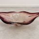 Blown glass fruit bowl in Murano style with purple reflections.