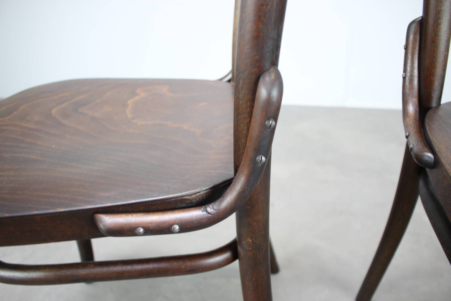 Pair of antique armchairs Model No B28 by Thonet, bent wood and caning, Austria 1920s.