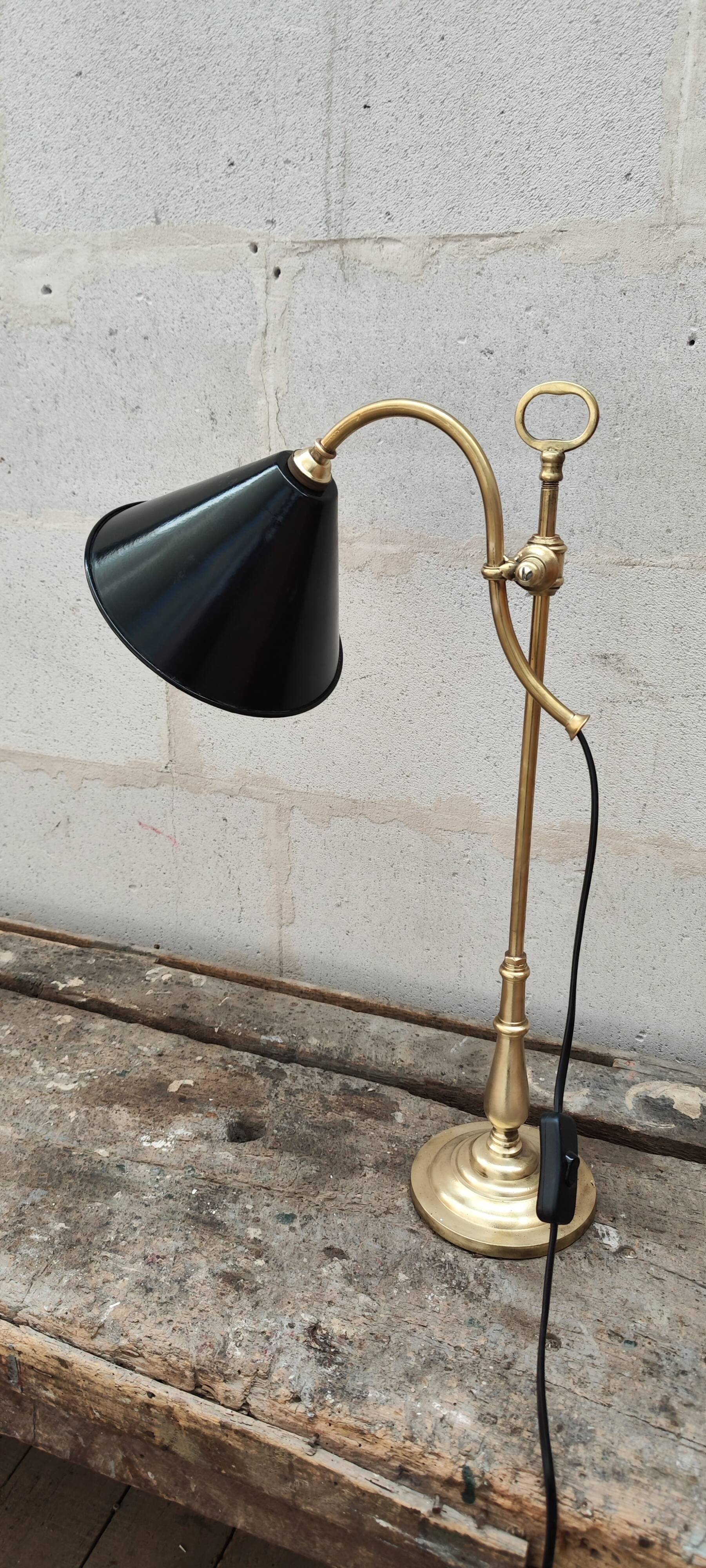 Old lamp in gilded bronze and brass with black enamel lampshade