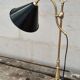 Old lamp in gilded bronze and brass with black enamel lampshade