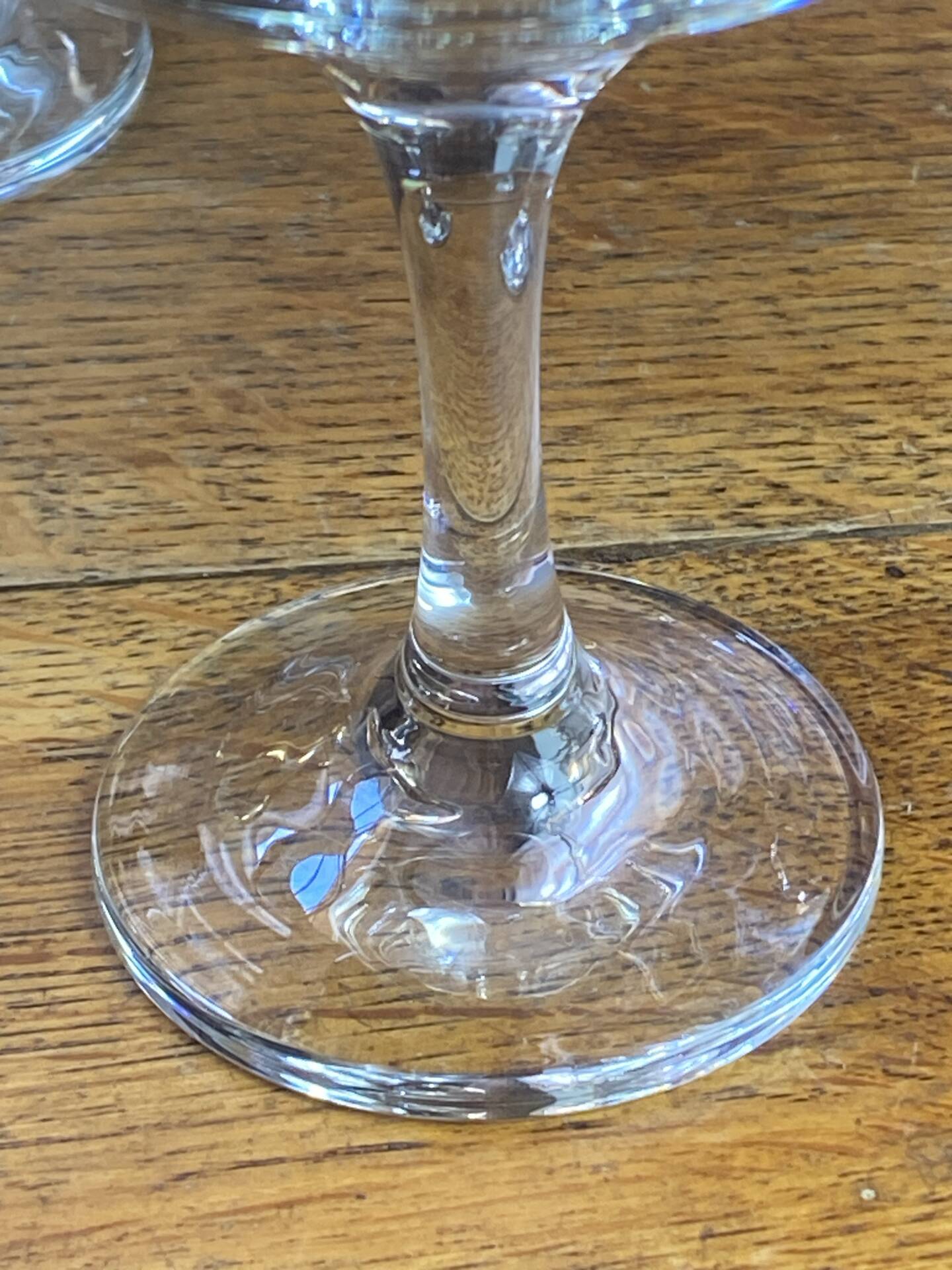 Champagne coupes or cocktail glasses with gilding