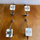 Set of four double hook coat racks in chromed metal