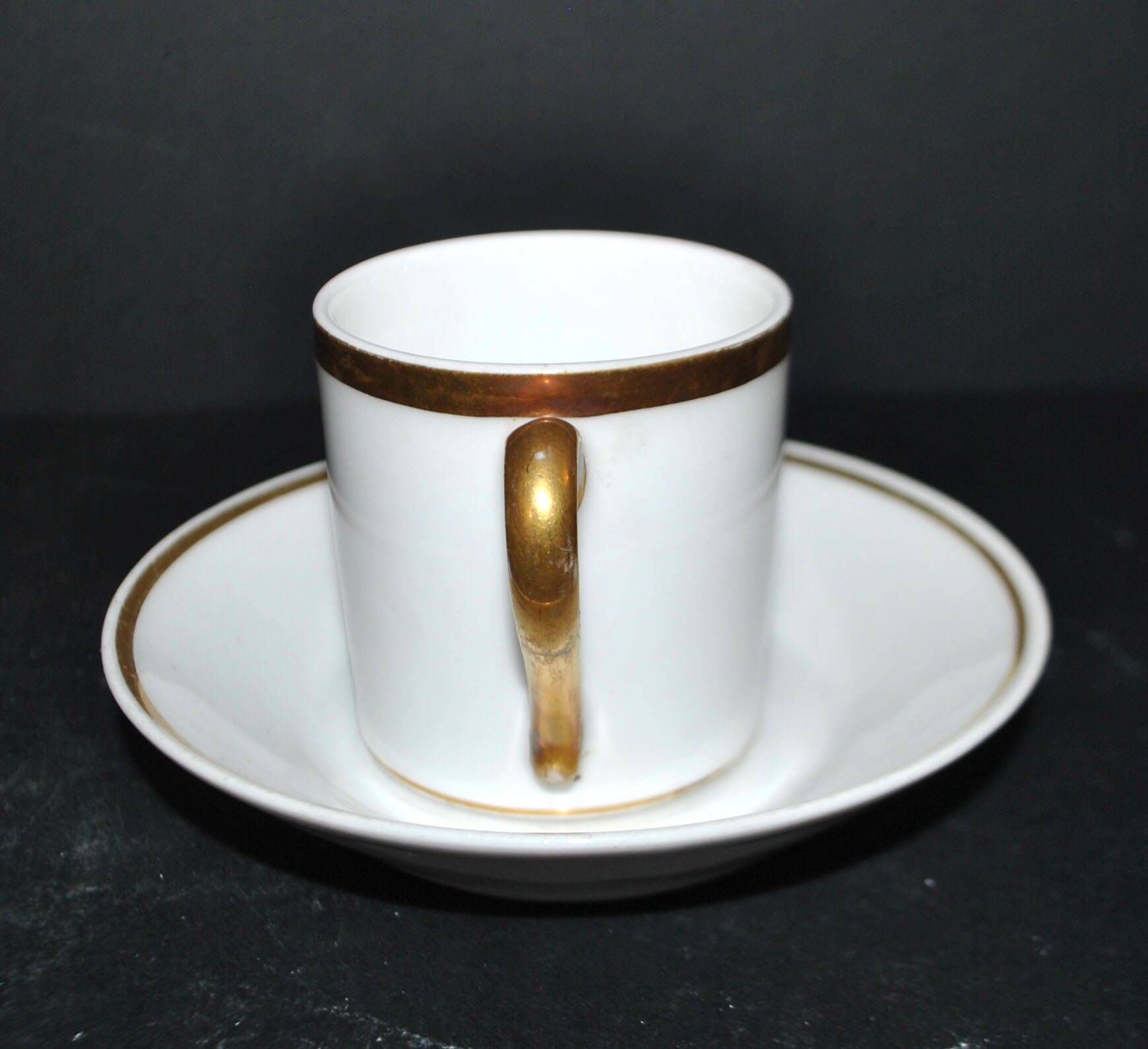 Charles Hebert Rouen porcelain – Antique litron coffee cup with gold trim.