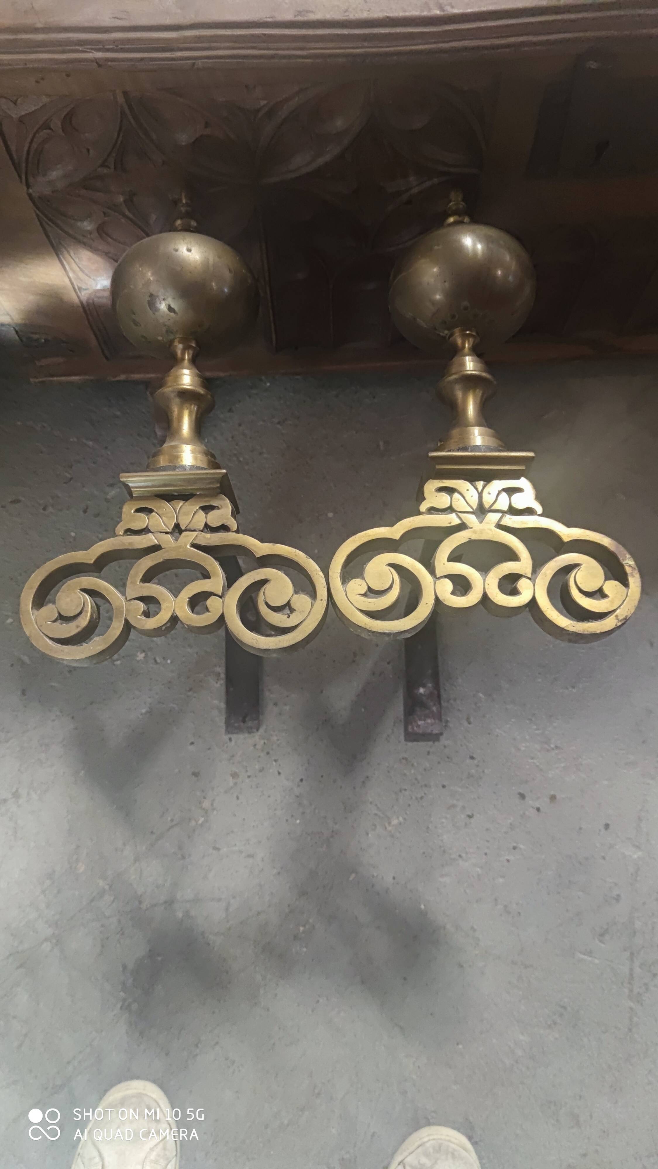 Pair of bronze and steel andirons, 19th century, Holland