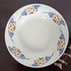 Shallow dish Hamage & Moulin des Loups, blue and orange floral stencil decoration.