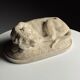 Marble sculpture of a reclining lion