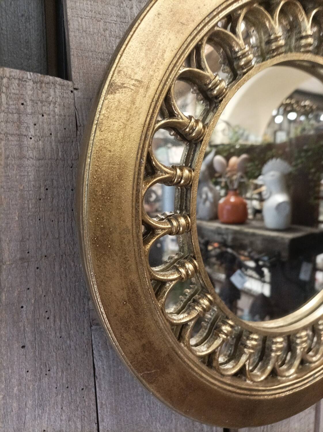 Round golden mirror