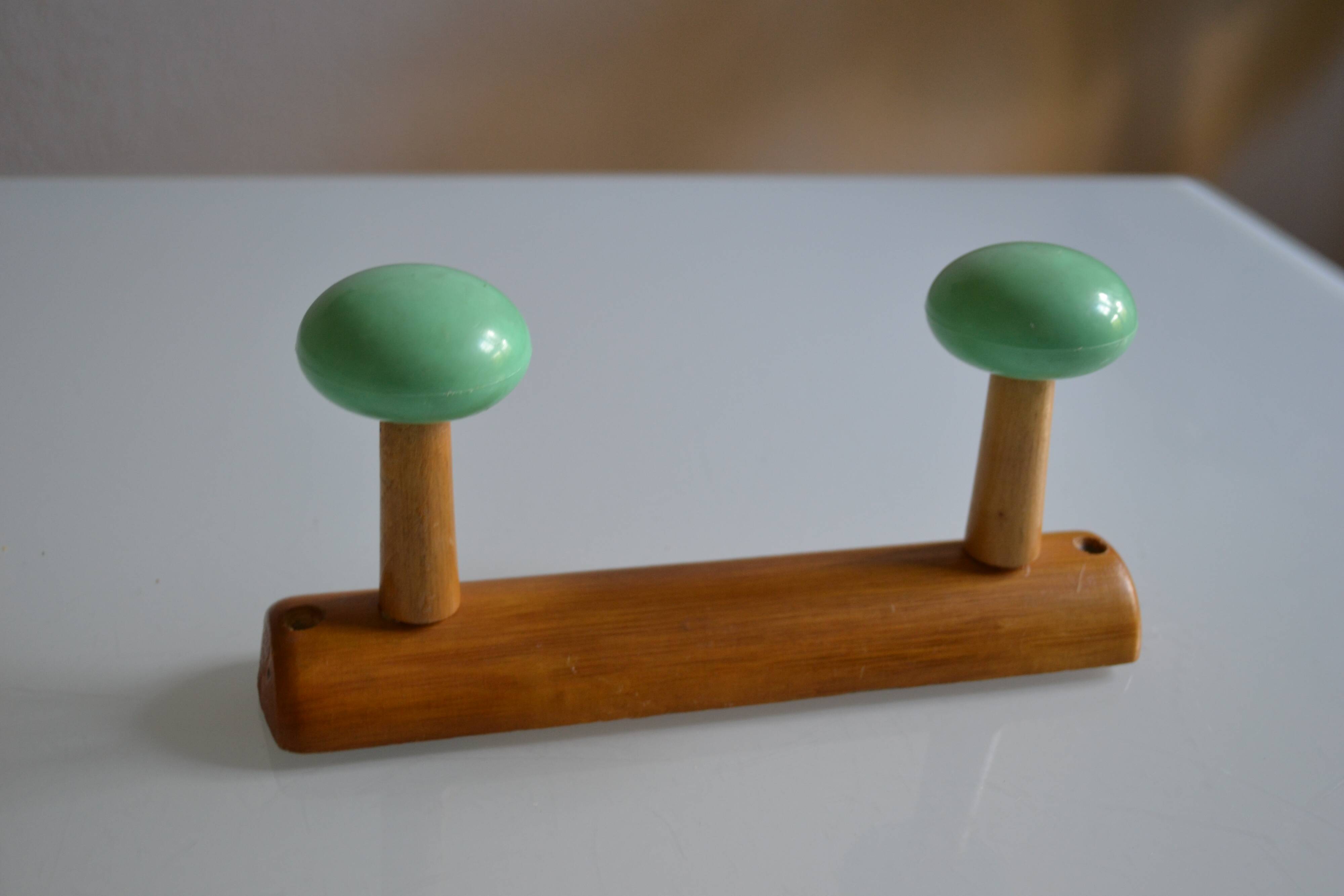 Wall coat rack with 2 hooks, wood and plastic, 60s style.