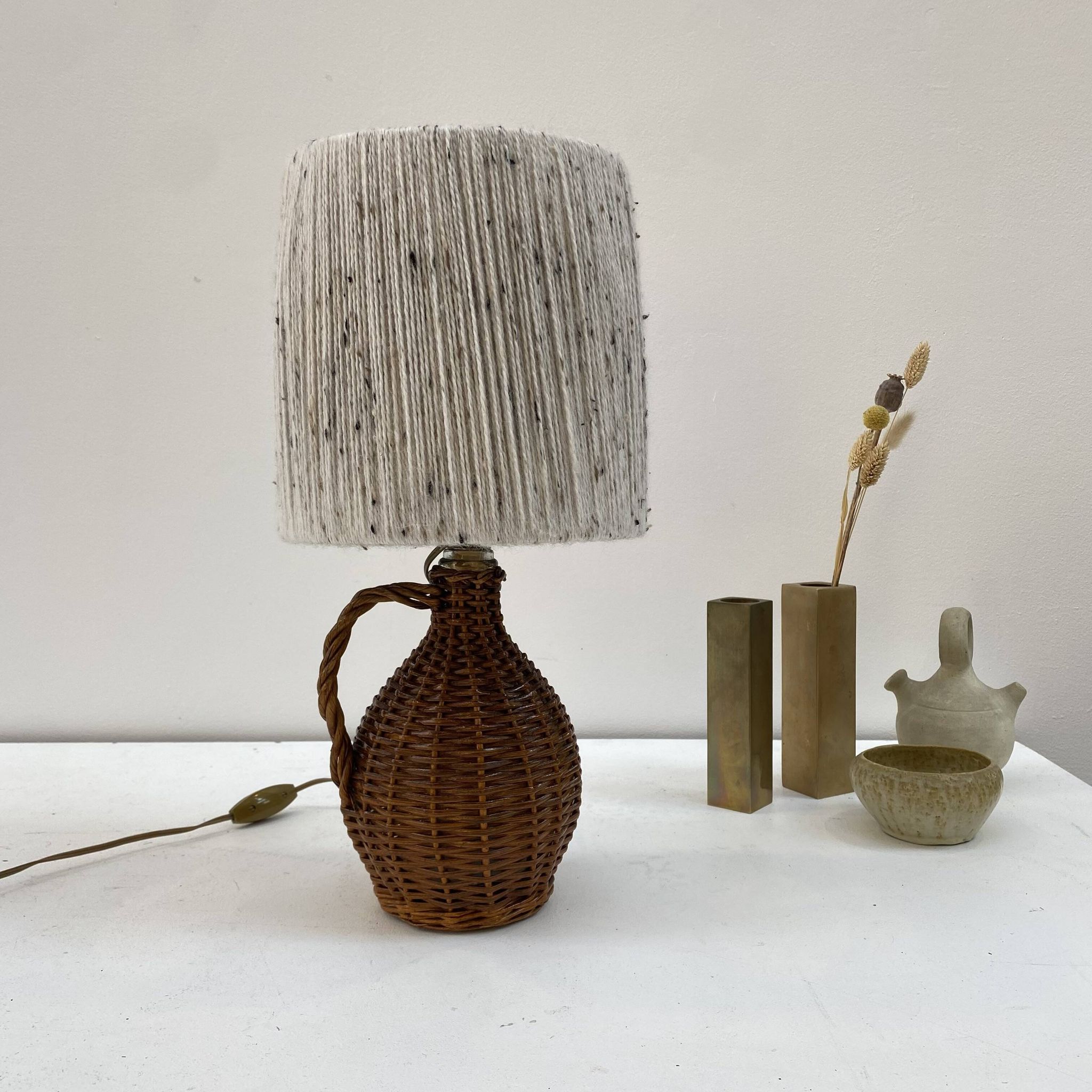 Rattan lamp and its mottled white wool lampshade