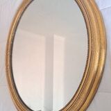 Miroir ancien en bois doré
