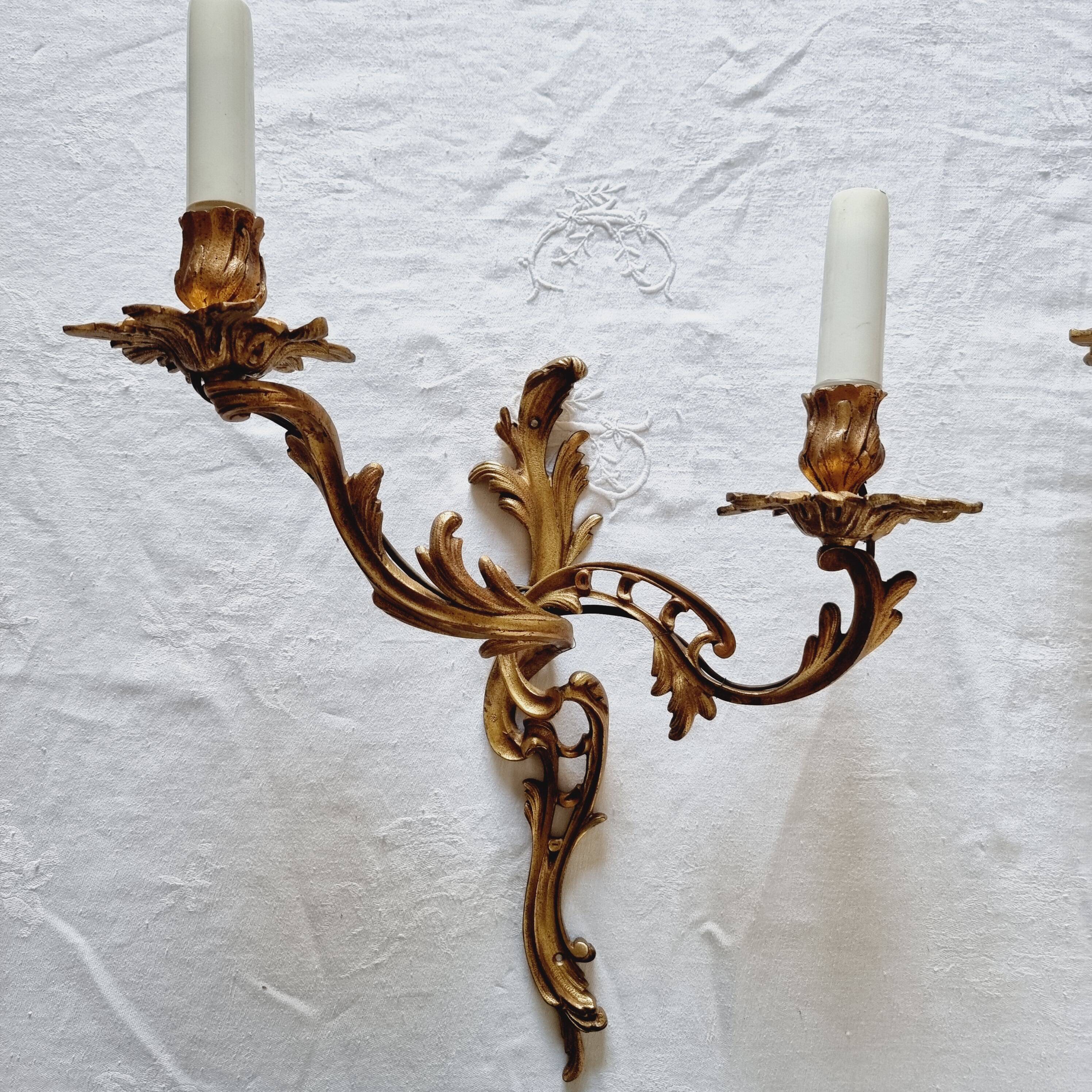 Pair of vintage French wall sconces in bronze, Louis XV Rococo style.