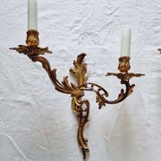 Pair of vintage French wall sconces in bronze, Louis XV Rococo style.