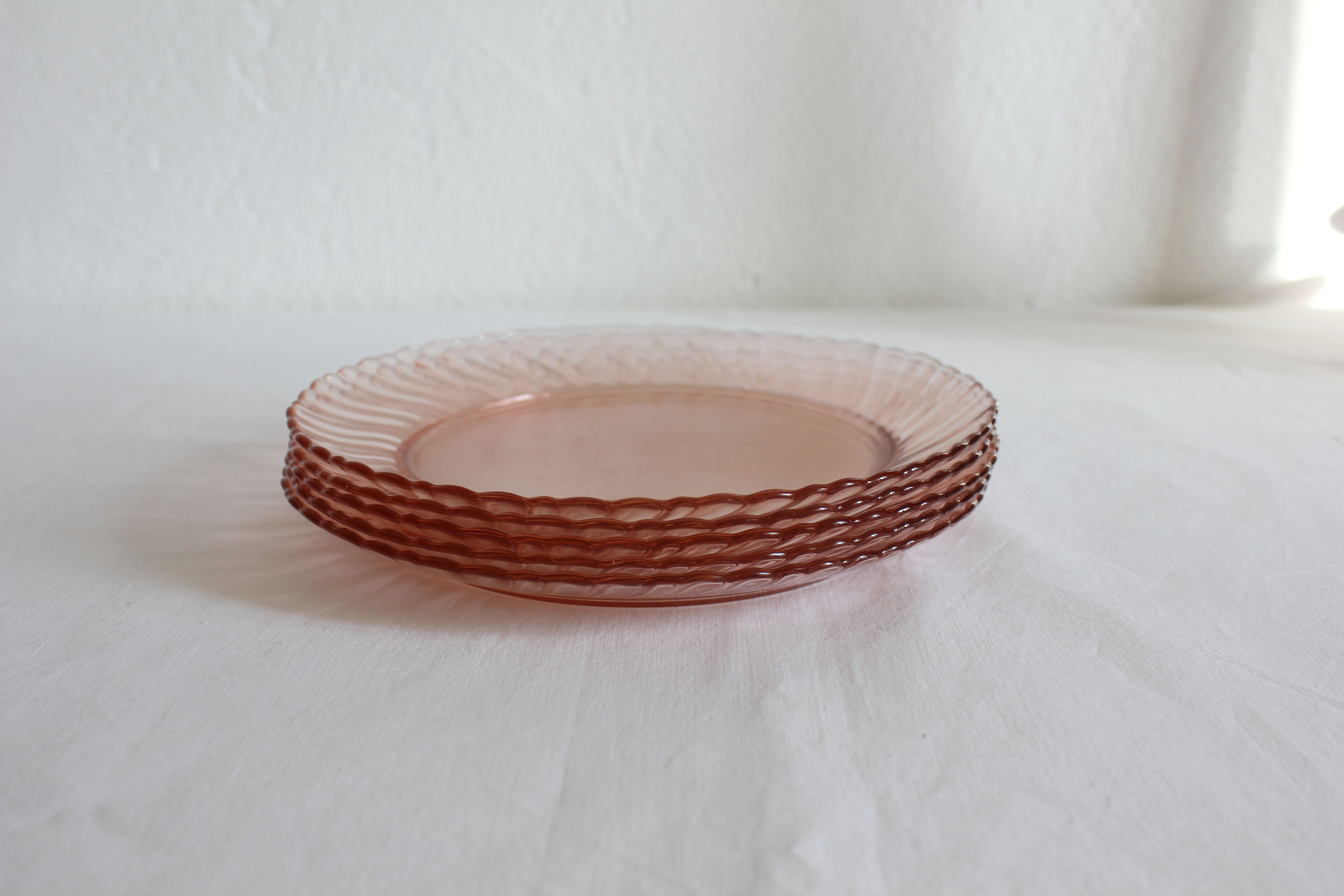 5 vintage Rosaline dessert plates in pink glass