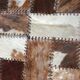 Patchwork carpet in cowhide 164x105cm from the 70s