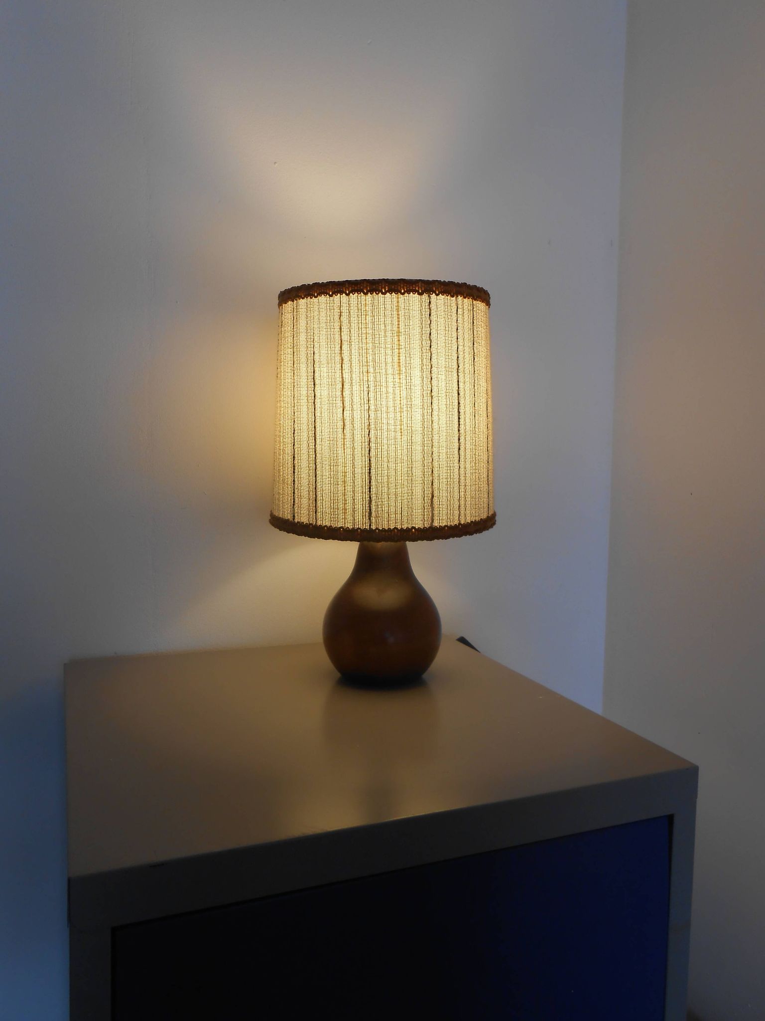 Carved wood lamp and wool yarn lampshade