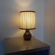 Carved wood lamp and wool yarn lampshade