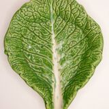 Trompe l'oeil cup bright green cabbage leaf in slip