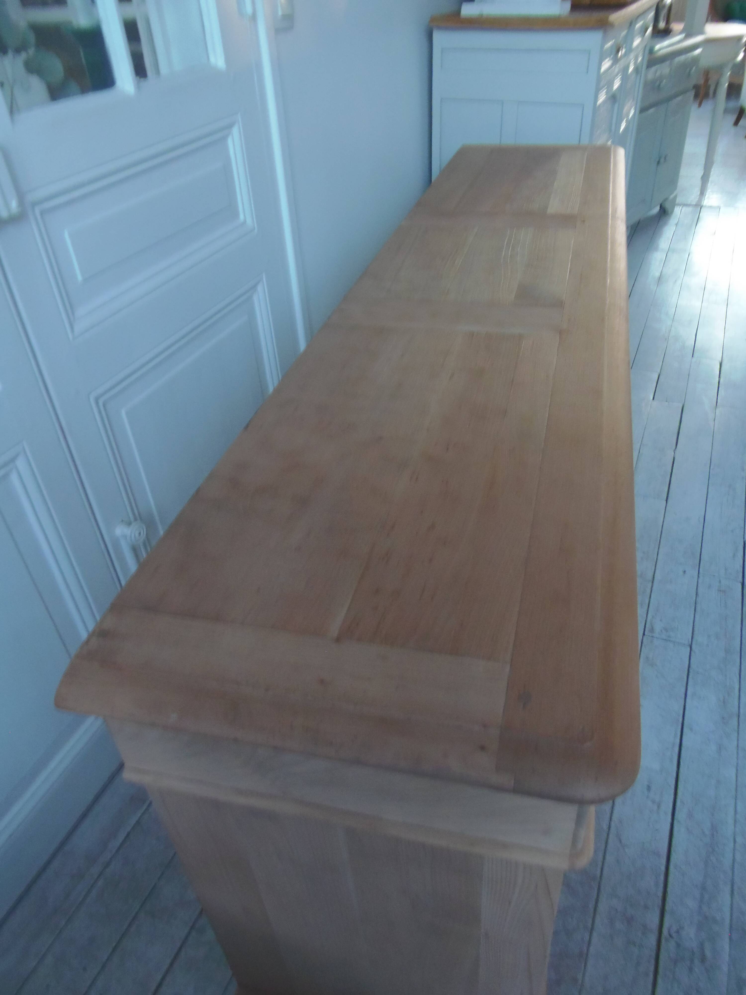 crafted dresser in raw solid wood.