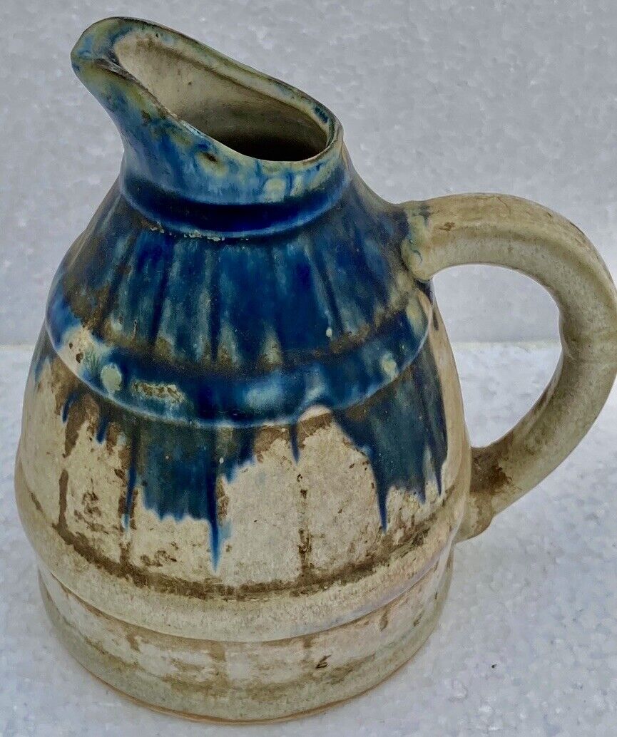 Enamelled ceramic pitcher