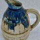 Enamelled ceramic pitcher