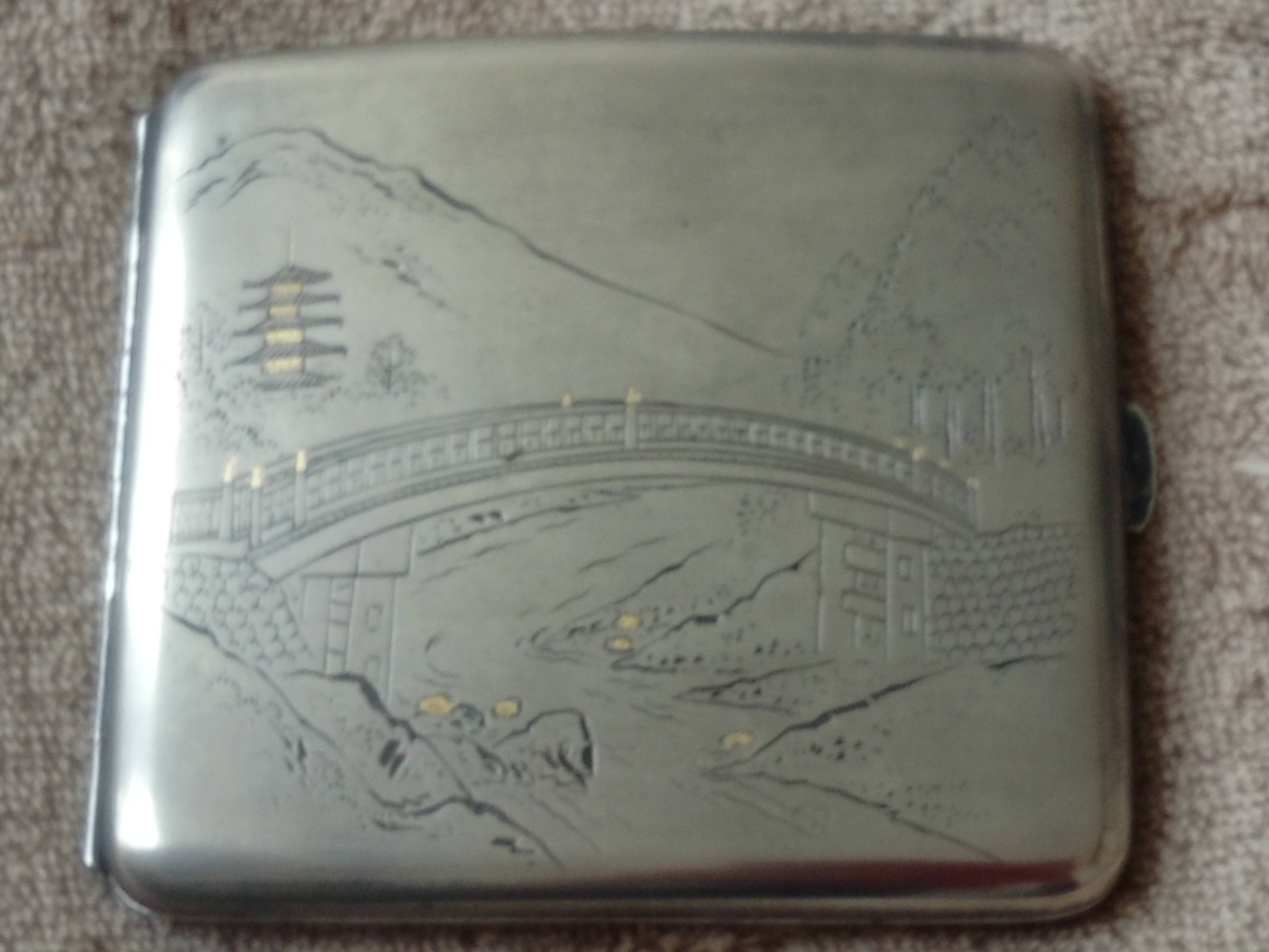 Old sterling silver cigarette case with Japanese decor