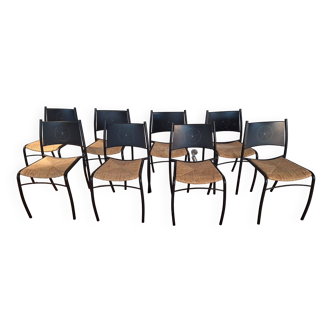 Set of 8 chairs in black lacquered metal and straw seats