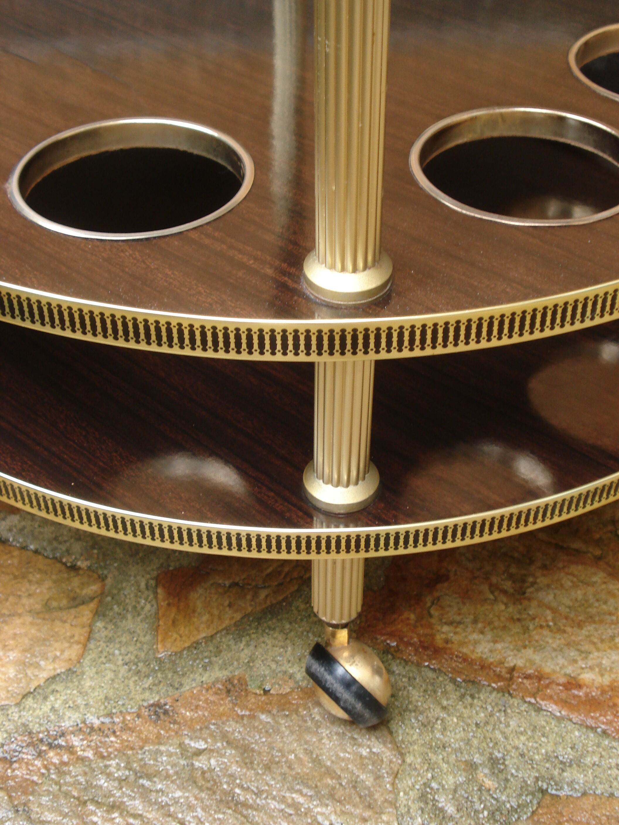 Round "bar" service in gilded metal on wheels and formica trays