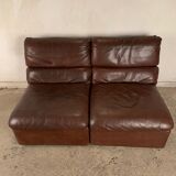 A pair of leather armchairs, Switzerland, 1970s