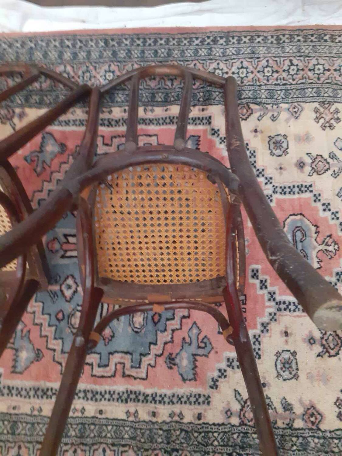 2 vintage caned bistro chairs