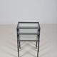Set of nesting tables in black stained wood and glass top, 1960s