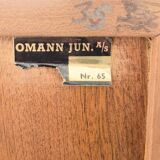 Narrow teak bookcase with two doors by Omann Jun, 1970s