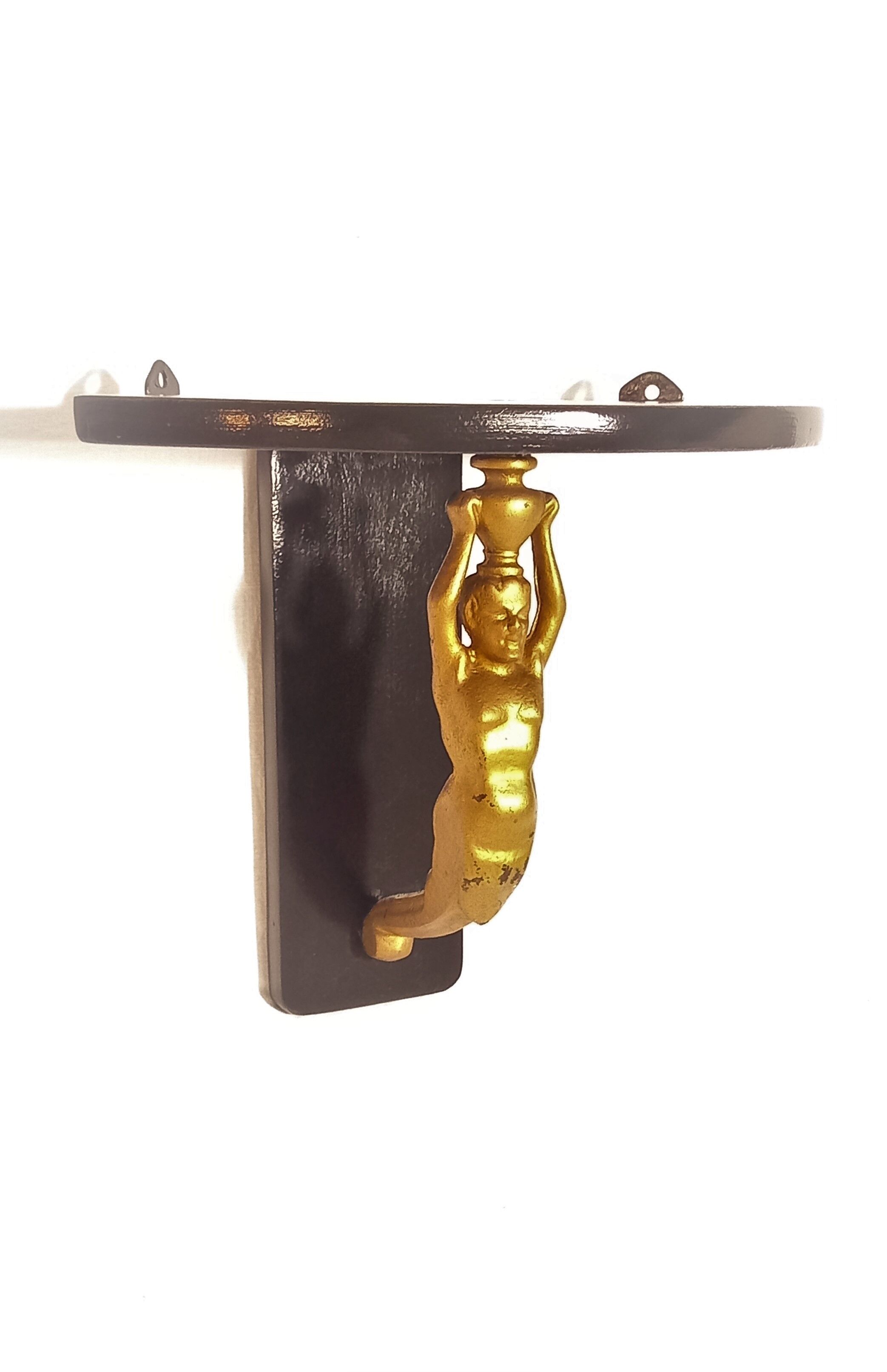 Corner wall lamp console with a golden cast iron djinn