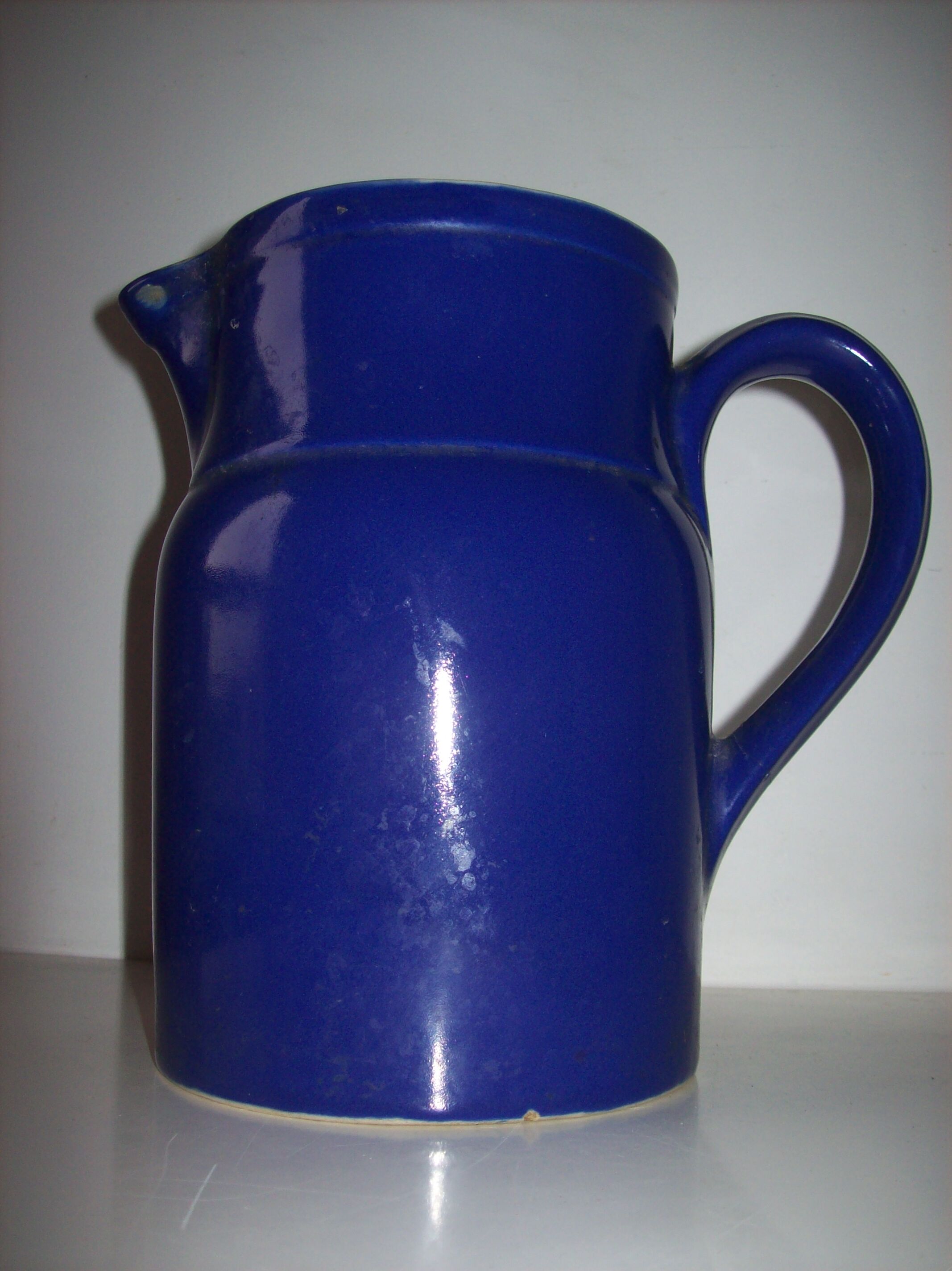 Old blue ceramic Digoin pitcher