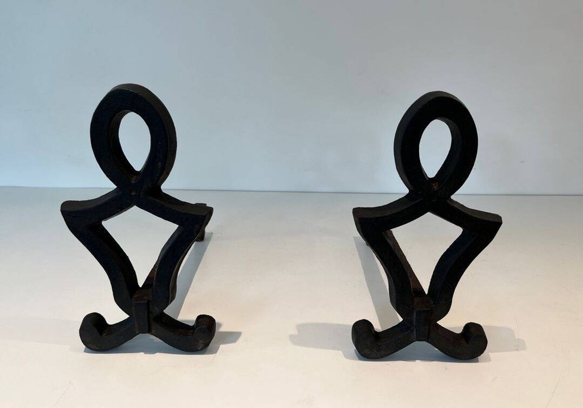 Pair of Cast Iron Chenets with Figurative Anthropomorphic Silhouette, by Raymon