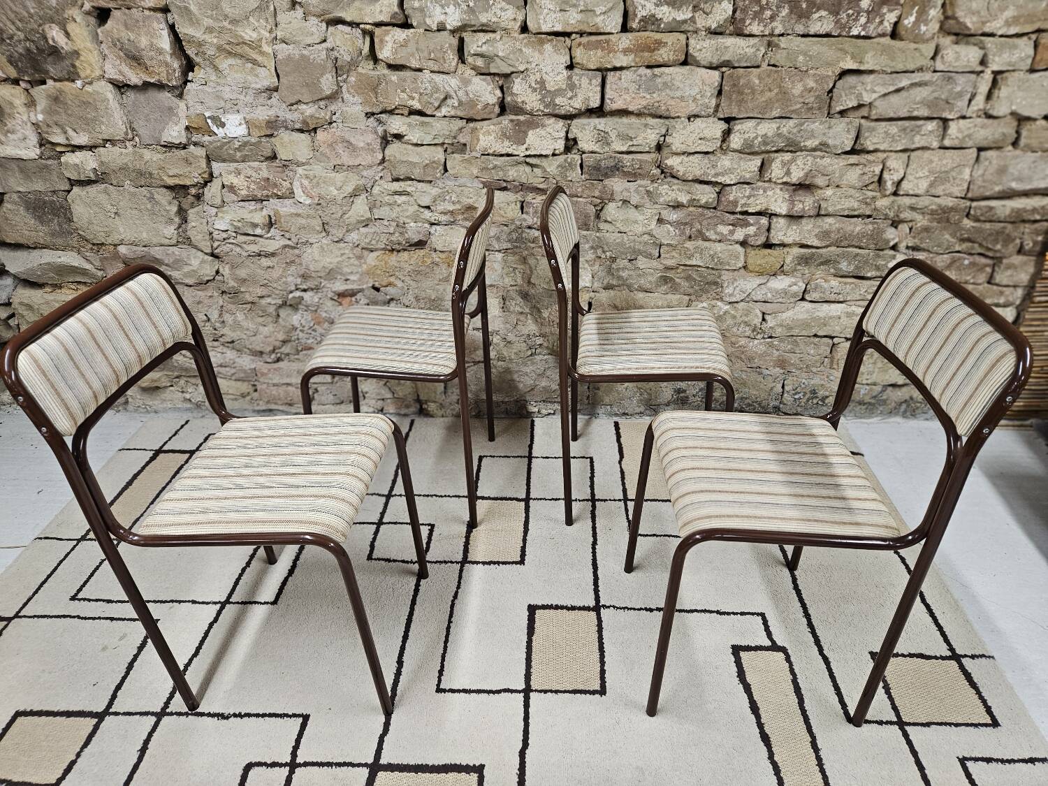 Set of 4 vintage stackable chairs 1980