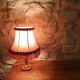 Vintage lamp, pink fringed pagoda shade and brass base.