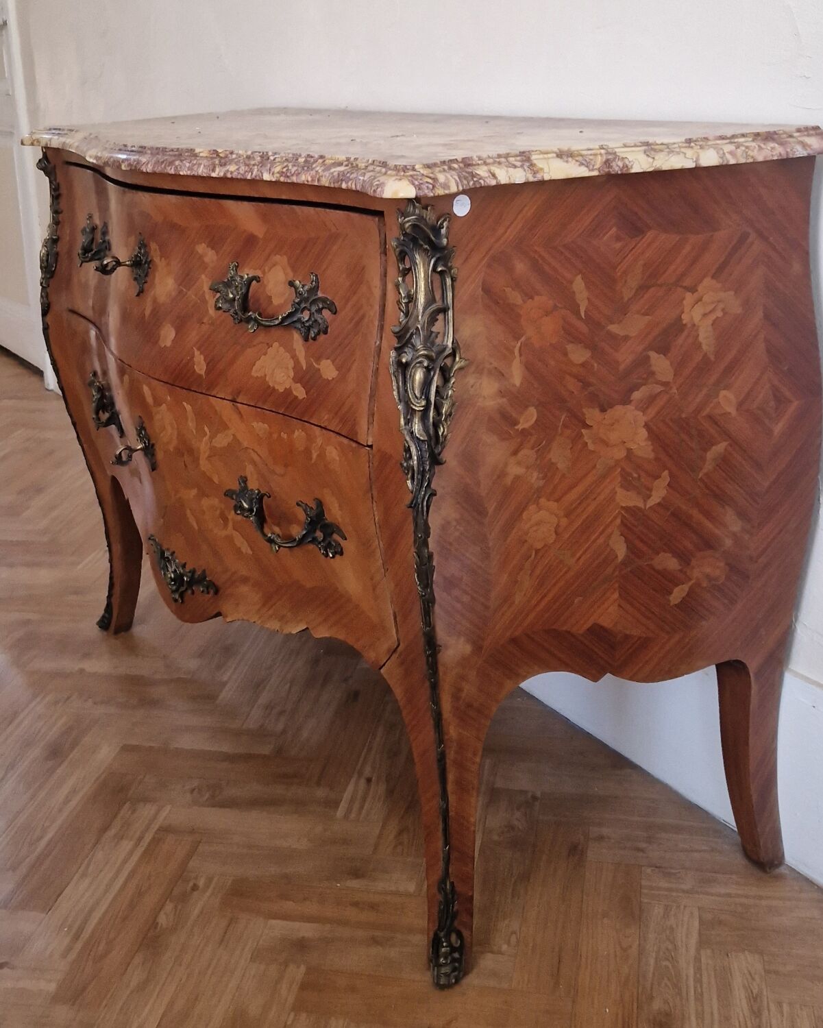Louis XV style commode, pink and ochre marble.
