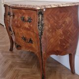 Louis XV style commode, pink and ochre marble.