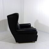 Black leather wingback chair on wheels 1960’s